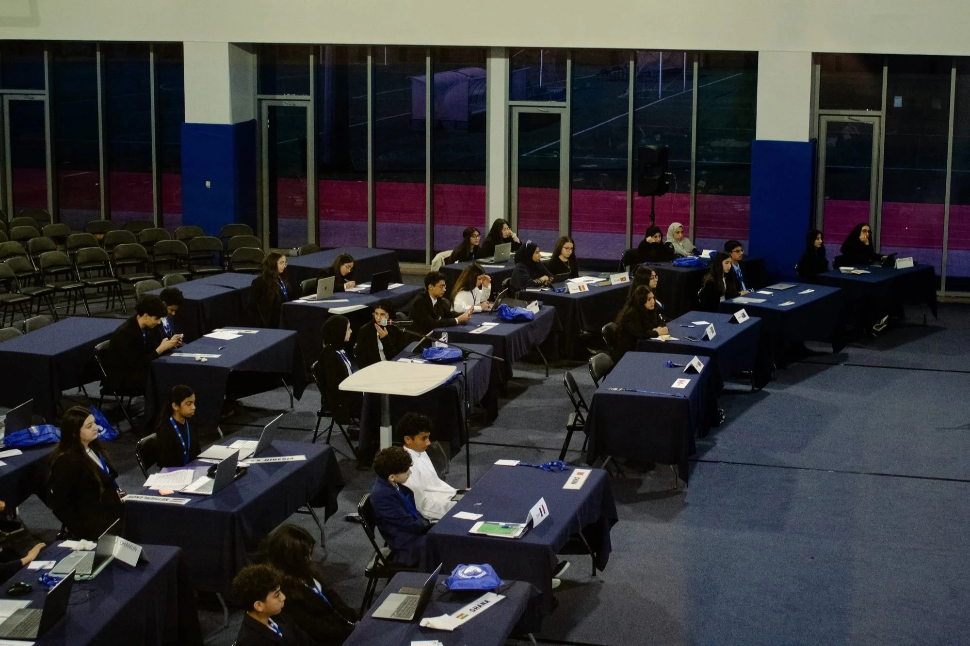 Delegates participating in a DHAMUN committee session